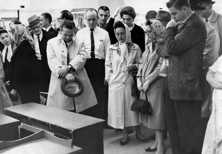 St. Louisans gather around department store TV for news of JFK assassination in 1963
